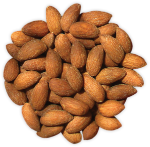 Pile of roasted almonds on black background.